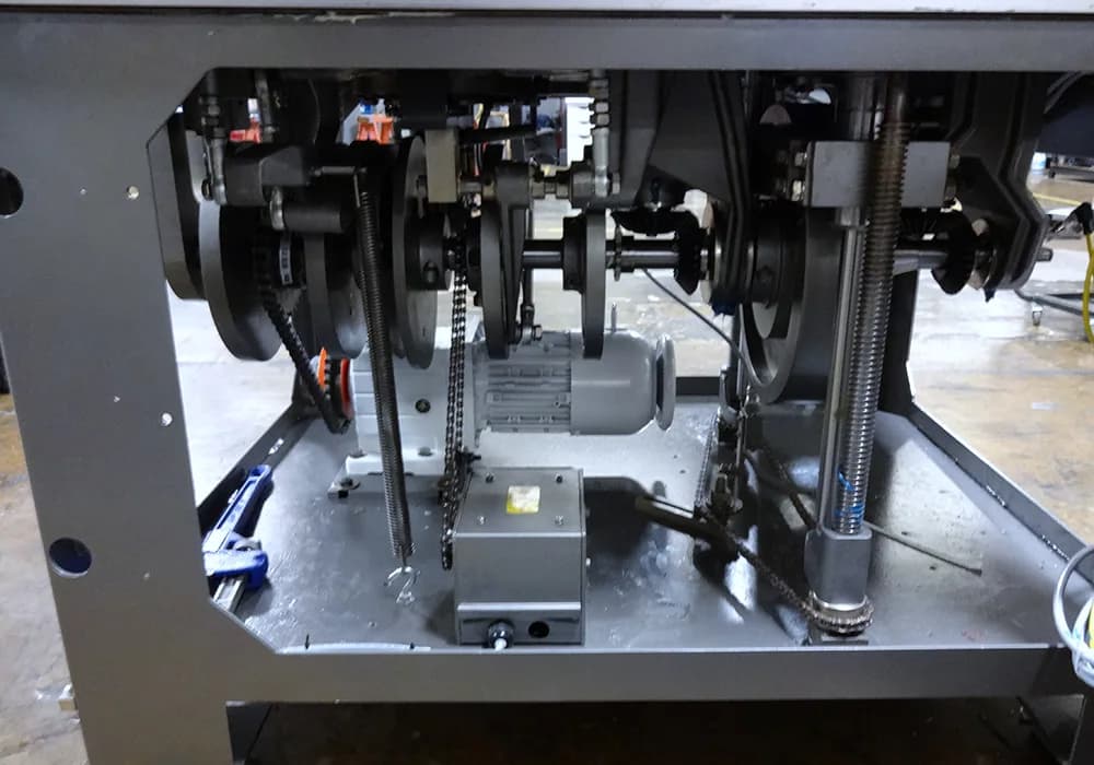 A close up of a Bosch 1500 capsule filler.