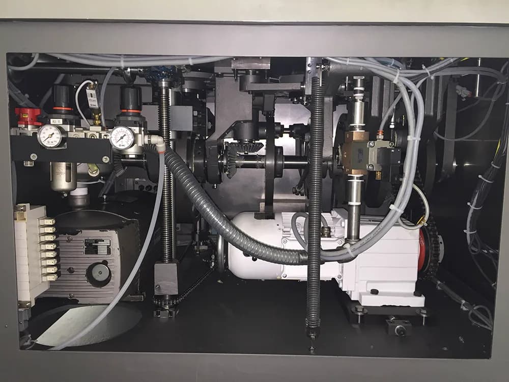 Inside the machine panel of the Index K120i capsule filler.